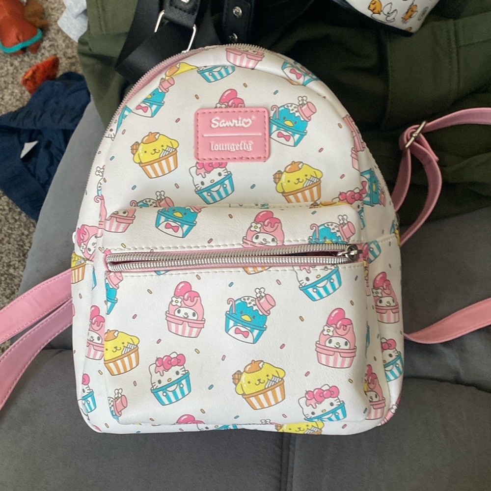 Loungefly Sanrio Cupcake Pattern Mini Backpack in White, Pink, Yellow, Blue